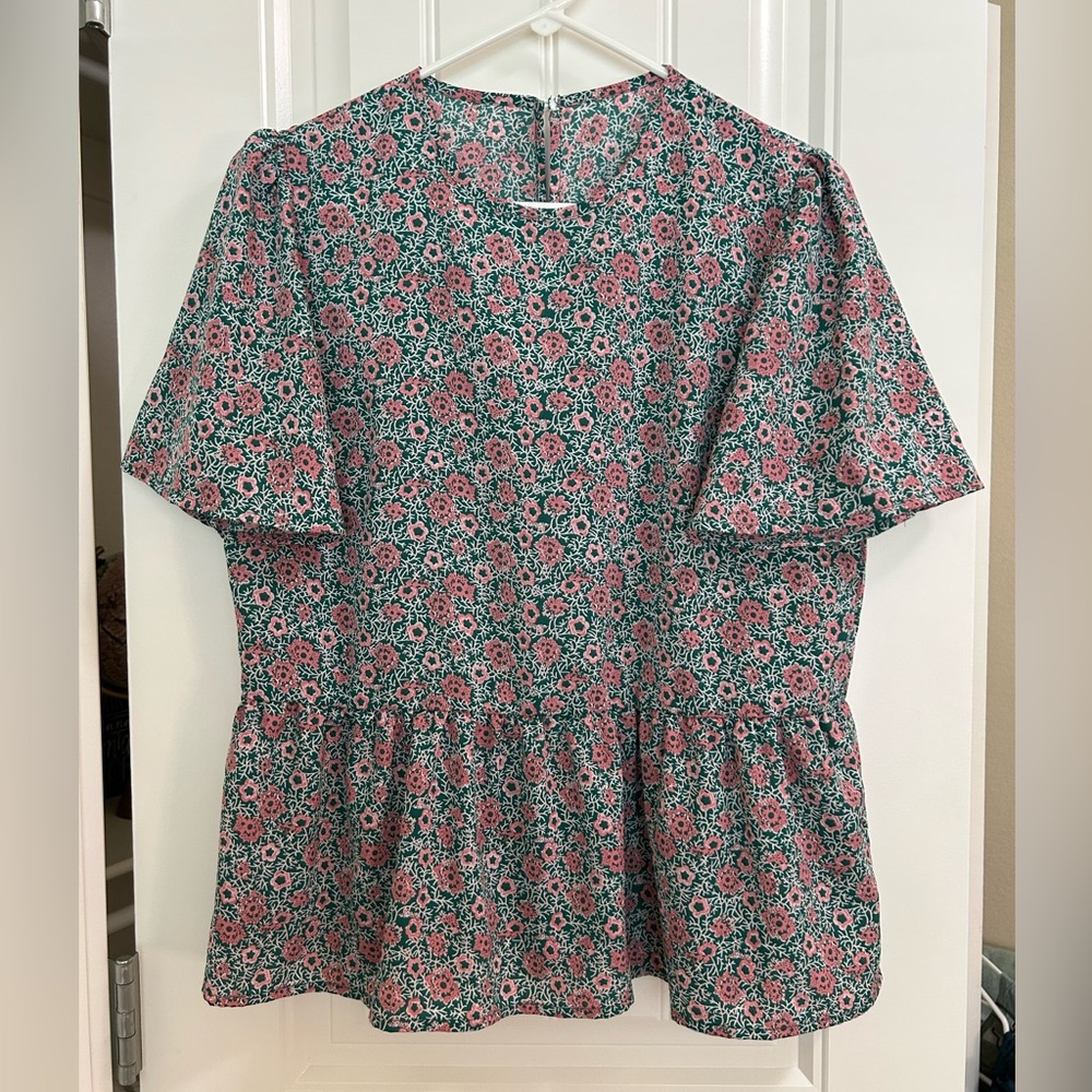 Floral peplum blouse M